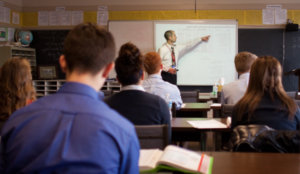 A Dayspring teacher in the classroom teaching an Advanced Math Course. Christian Education vs Public School